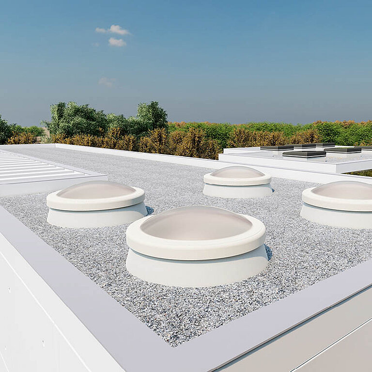 LAMILUX Lichtkuppel F100 rund auf Flachdach mit Kiesauflage zur natürlichen Tageslichtversorgung