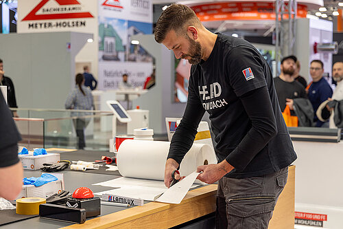 LAMILUX Mission Flachdach Teilnehmer bei Zuschnitt